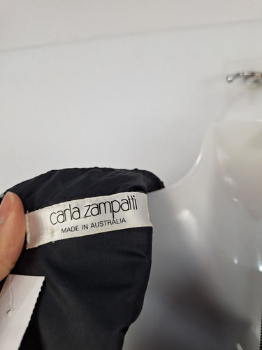 Second-Hand - Carla Zampatti Leatherlook Pleated Fitted Midi Dress Size 8 - SwapUp
