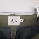 Second-Hand - Aje Muted Taupe Faux Leather Cargo Pants Size 6 - SwapUp