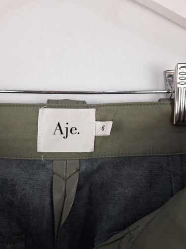 Second-Hand - Aje Muted Taupe Faux Leather Cargo Pants Size 6 - SwapUp