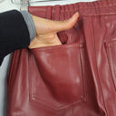 Second-Hand - Aje Wine Faux Leather Cargo Pants Size 6 - SwapUp