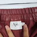 Second-Hand - Aje Wine Faux Leather Cargo Pants Size 6 - SwapUp