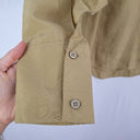 Second-Hand - COS Elevated Olive Cape Sleeve Top Size 6 - SwapUp