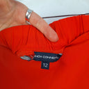 Second-Hand - French Connection Blood Orange Cross Over Wrap Skirt Size 12 - SwapUp
