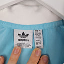 Second-Hand - Adidas Sky Blue Satin Feel Jersey Top Size XS - SwapUp