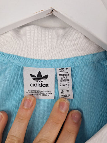 Second-Hand - Adidas Sky Blue Satin Feel Jersey Top Size XS - SwapUp