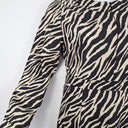 Second-Hand - Serafina Cream Zebra Zip Midi Dress Size M - SwapUp