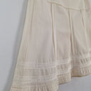 Second-Hand - Nina Ricci Cream Panelled Mini Skirt Size 10 - SwapUp