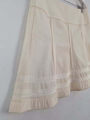 Second-Hand - Nina Ricci Cream Panelled Mini Skirt Size 10 - SwapUp