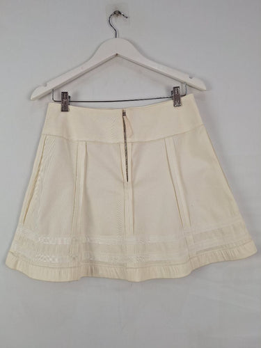 Second-Hand - Nina Ricci Cream Panelled Mini Skirt Size 10 - SwapUp