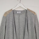 Second-Hand - Runaway Sleek Gold Cap Sleeved Cardigan Size 6 - SwapUp