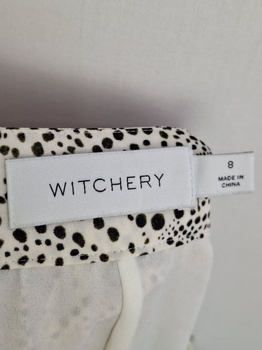 Second-Hand - Witchery Dotted Wave Choppy Hem Midi Skirt Size 8 - SwapUp