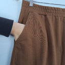 Second-Hand - Assorted Brands Edgy Tobacco Jersey Midi Skirt Size M - SwapUp