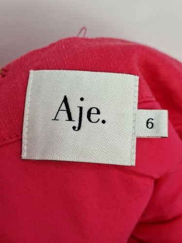 Second-Hand - Aje Fuscia Pink Arista Tulip Sleeve Mini Dress Size 6 - SwapUp