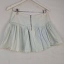 Second-Hand - Seed Light Wash Distressed Mini Skirt Size 8 - SwapUp