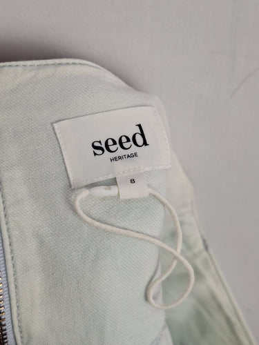 Second-Hand - Seed Light Wash Distressed Mini Skirt Size 8 - SwapUp