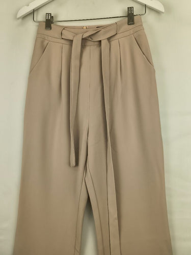 Second-Hand - Aloha Studio Light Beige Tie Front Pleat Pants Size XS - SwapUp