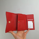 Second-Hand - Charles & Keith Tangerine Tri-fold Wallet - SwapUp