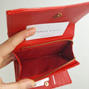 Second-Hand - Charles & Keith Tangerine Tri-fold Wallet - SwapUp