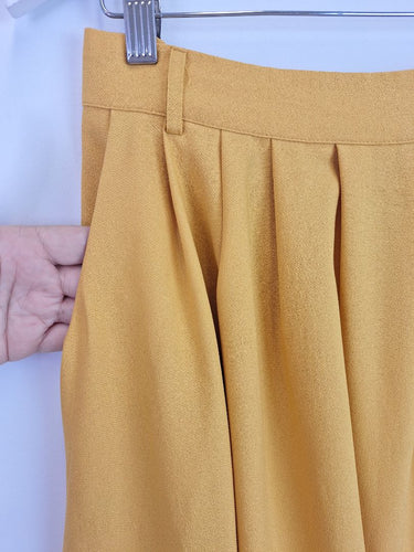 Second-Hand - Modcloth Honey Pleated Everyday Midi Skirt Size L - SwapUp