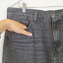Second-Hand - Levi's Staple Front Slit Faded Black Denim Maxi Skirt Size 14 - SwapUp