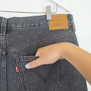 Second-Hand - Levi's Staple Front Slit Faded Black Denim Maxi Skirt Size 14 - SwapUp