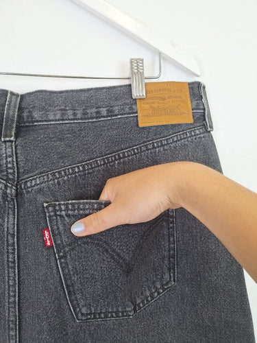 Second-Hand - Levi's Staple Front Slit Faded Black Denim Maxi Skirt Size 14 - SwapUp