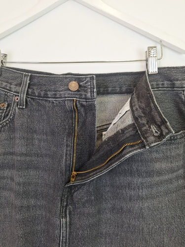 Second-Hand - Levi's Staple Front Slit Faded Black Denim Maxi Skirt Size 14 - SwapUp