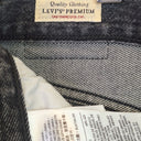 Second-Hand - Levi's Staple Front Slit Faded Black Denim Maxi Skirt Size 14 - SwapUp