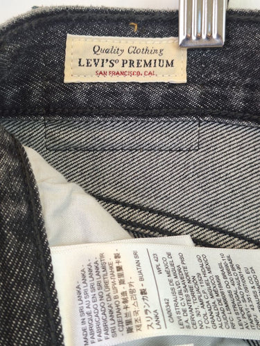 Second-Hand - Levi's Staple Front Slit Faded Black Denim Maxi Skirt Size 14 - SwapUp