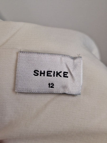 Second-Hand - Sheike Timeless White Frill Jumpsuit Size 12 - SwapUp