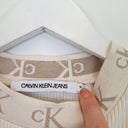 Second-Hand - Calvin Klein Cream Ribbed Monogram Detail T-shirt Size XL - SwapUp