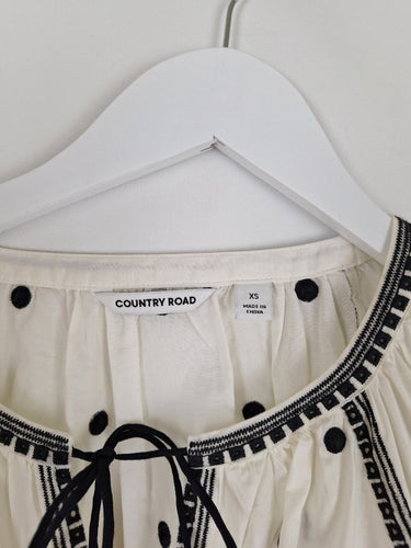 Second-Hand - Country Road Embroidered Dot And Tassel Blouse Size XS - SwapUp