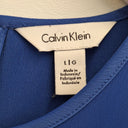 Second-Hand - Calvin Klein Sky Blue Satin Peplum Top Size L - SwapUp