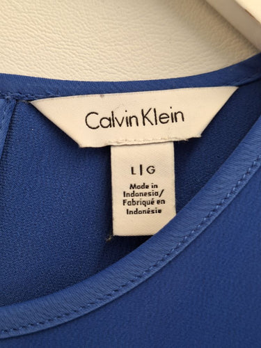 Second-Hand - Calvin Klein Sky Blue Satin Peplum Top Size L - SwapUp