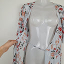 Second-Hand - Piper Pretty Soft Blue Floral Wrap Midi Dress Size 6 - SwapUp
