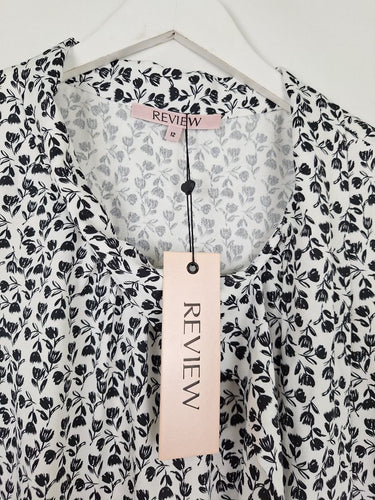 Second-Hand - Review Floaty Tulip Royce Top Size 12 - SwapUp