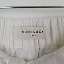 Second-Hand - Nude Lucy Capsule Crisp Thilda Linen Pleated Shorts Size M - SwapUp