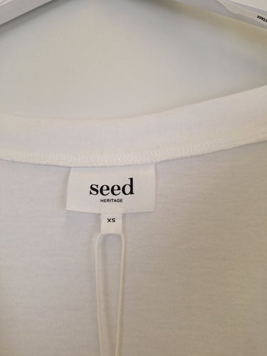 Second-Hand - Seed Whisper White Asymmetric Top Size XS - SwapUp