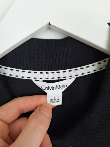 Second-Hand - Calvin Klein Staple Jersey Cotton Polo Shirt Size L - SwapUp