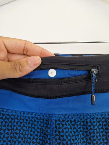 Second-Hand - Lululemon Blue Triangle Pattern Active Shorts Size 10 - SwapUp