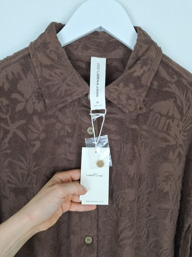 Second-Hand - Lorna Jane Espresso Dusty Palm Towelling Oversized Skirt Size M - SwapUp