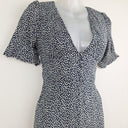 Second-Hand - DISSH Ditsy Floral Navy Jumpsuit Size 8 - SwapUp