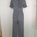 Second-Hand - DISSH Ditsy Floral Navy Jumpsuit Size 8 - SwapUp