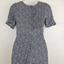 Second-Hand - DISSH Ditsy Floral Navy Jumpsuit Size 8 - SwapUp
