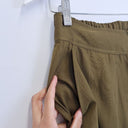 Second-Hand - Elk Olive Kiiltava Tapered Pants Pants Size 8 - SwapUp