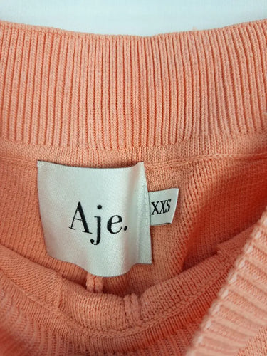 Aje Salmon Knitted High-waisted Shorts Size XXS by SwapUp-Online Second Hand Store-Online Thrift Store