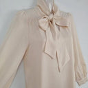 Second-Hand - Mona Studio Elegant Tied Neck Midi Dress Size S - SwapUp